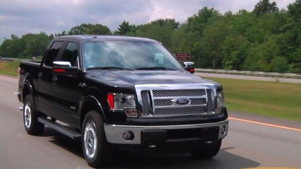 2012 Ford F-150 in black.
