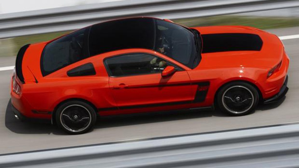 2012 Ford Mustang in red.