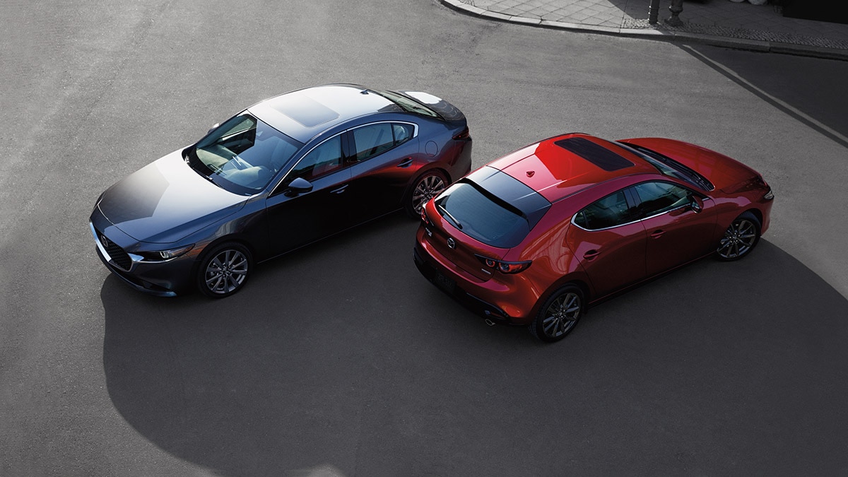 2024 Mazda3 in grey and red.