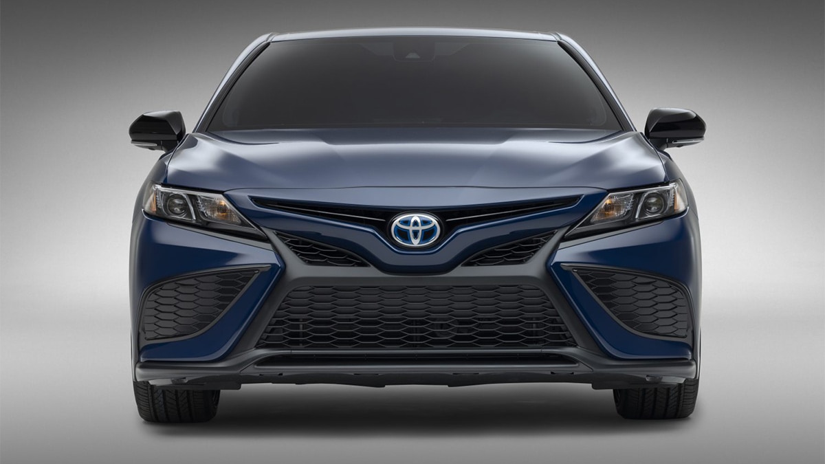2024 Toyota Camry Hybrid in blue.