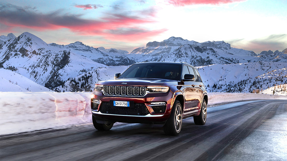 2024 Jeep Grand Cherokee in maroon.