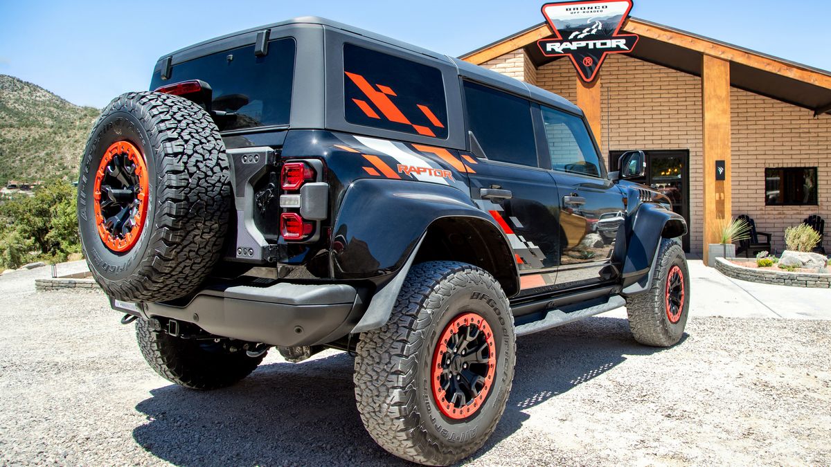 Rear view: The 2024 Ford Bronco Raptor in the Code Orange appearance package.