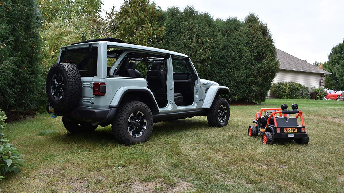 Comparison 2024 Jeep Wrangler Rubicon X 4xe vs. Power Wheels Jeep