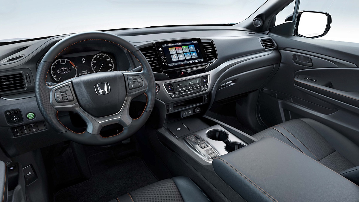 The new digital instrument cluster and 9-inch touchscreen, as seen in the 2024 Ridgeline TrailSport. 
