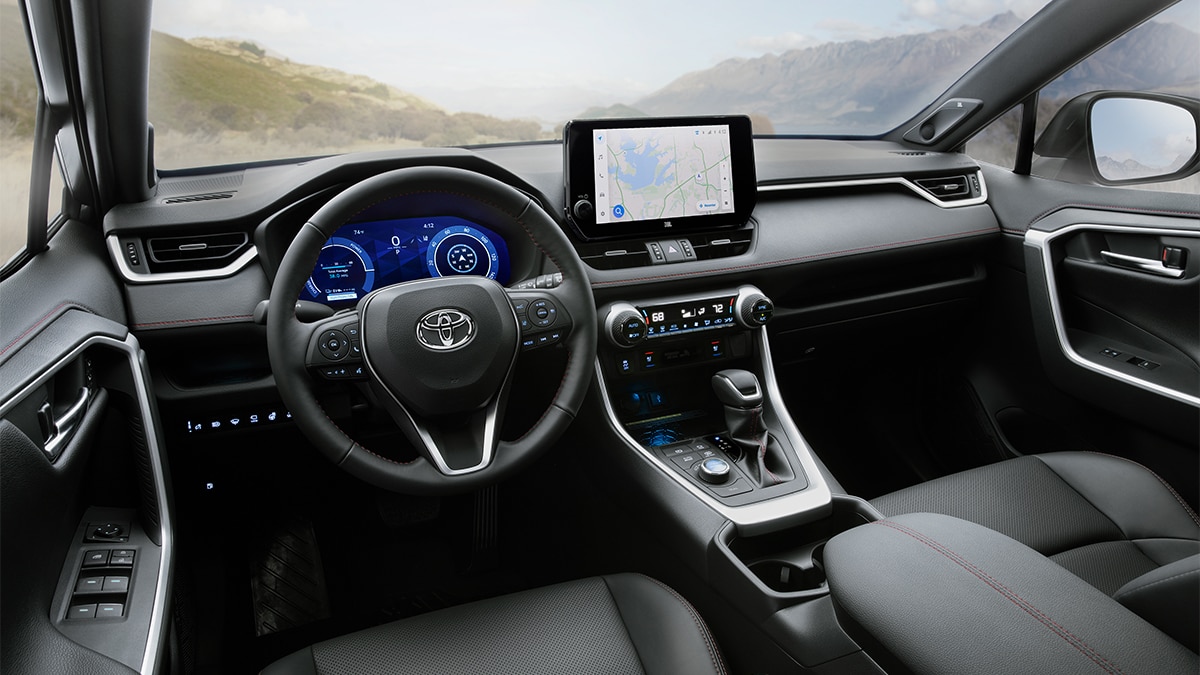 The RAV4 Prime in XSE trim gets SofTex upholstery with red stitching. 