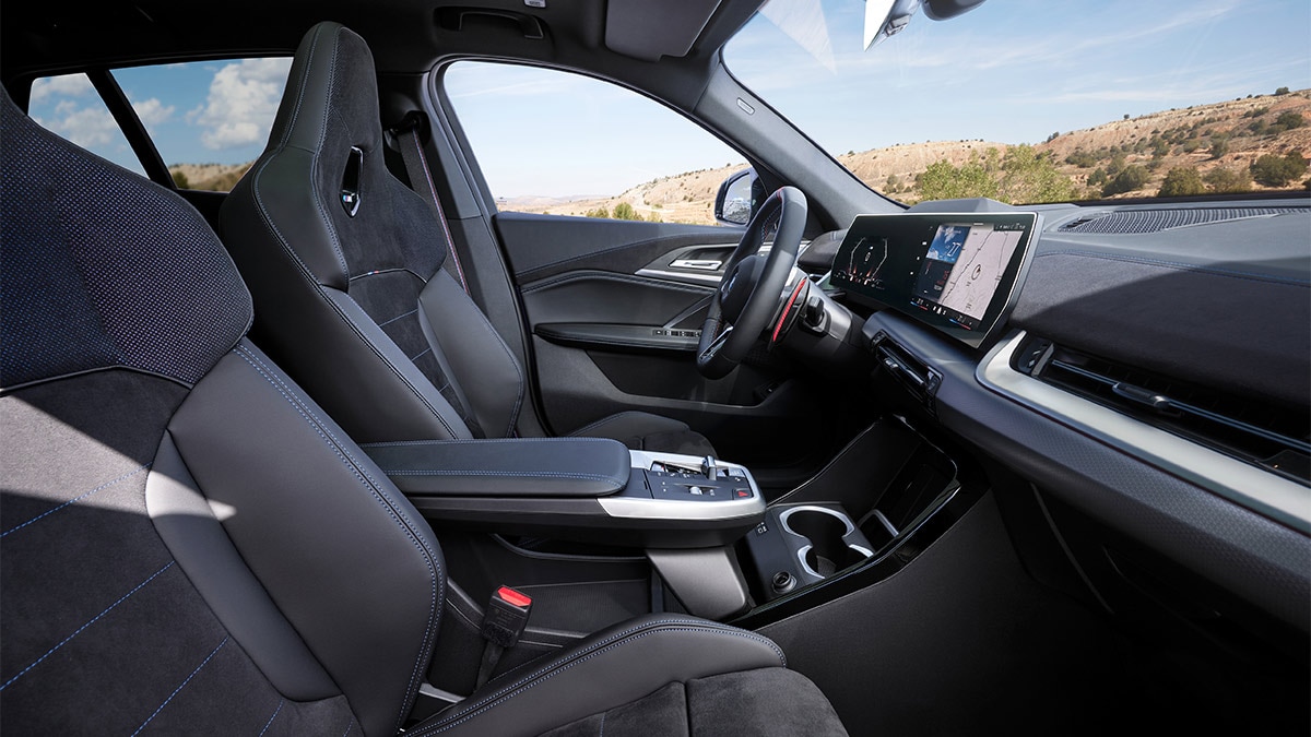 The optional M Sport seats have integral head restraints and illuminated M logos in the upper back area.