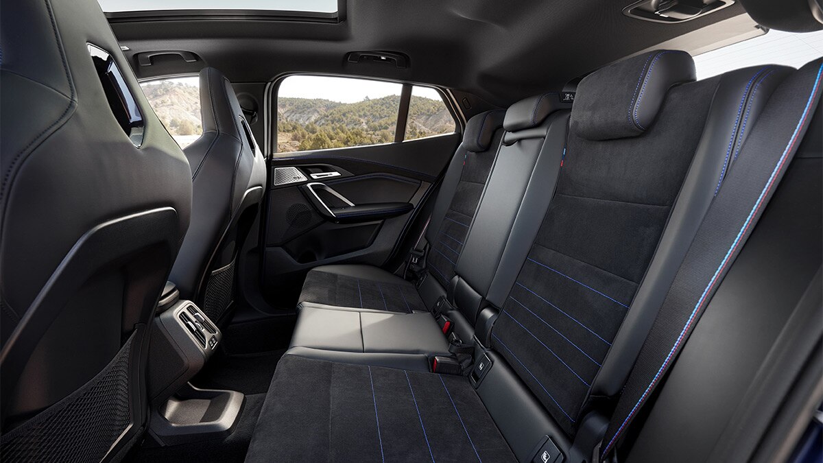 The back seat of the new X2 gets a/c vents and a pair of USB-C charge ports.  