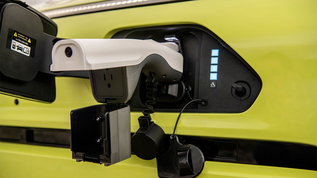 Using this adapter, the 2024 Kona Electric can be used to charge electrical equipment like electric bikes, scooters, or camping equipment. 