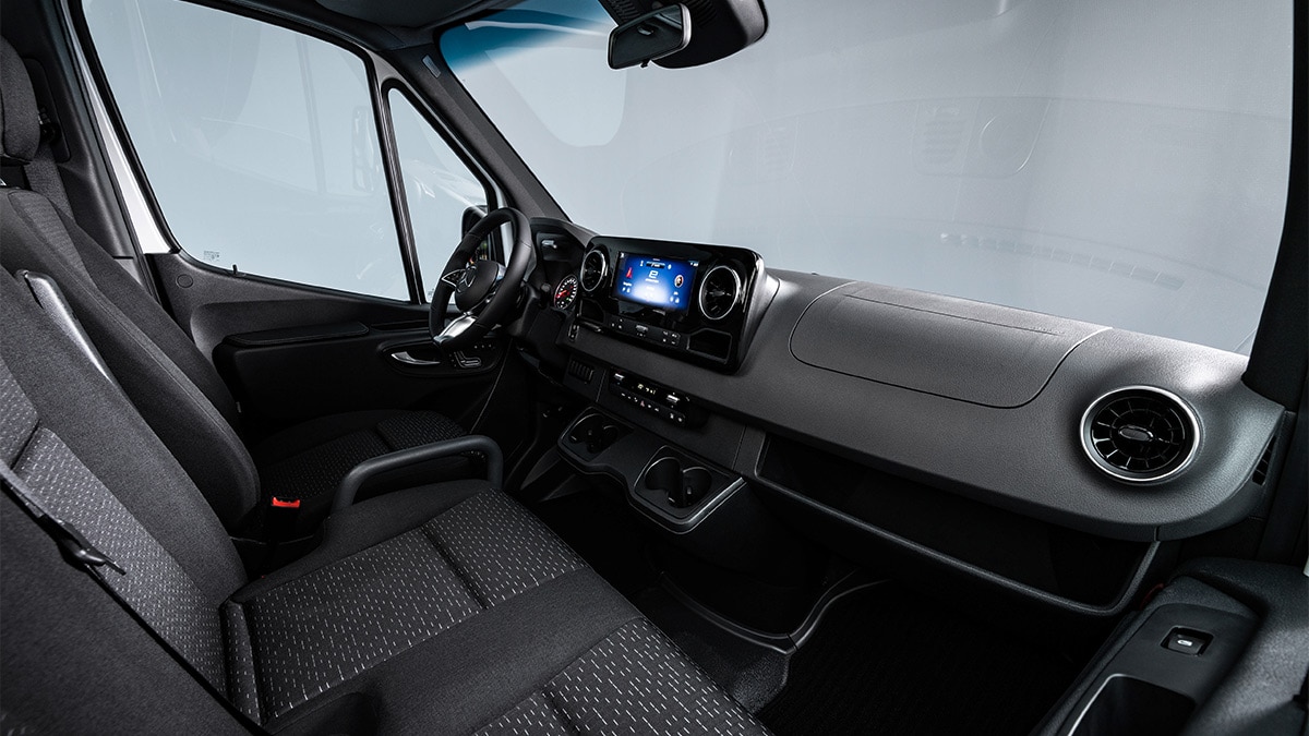 This 2024 Mercedes-Benz eSprinter Cargo Van has seating for three up front. 