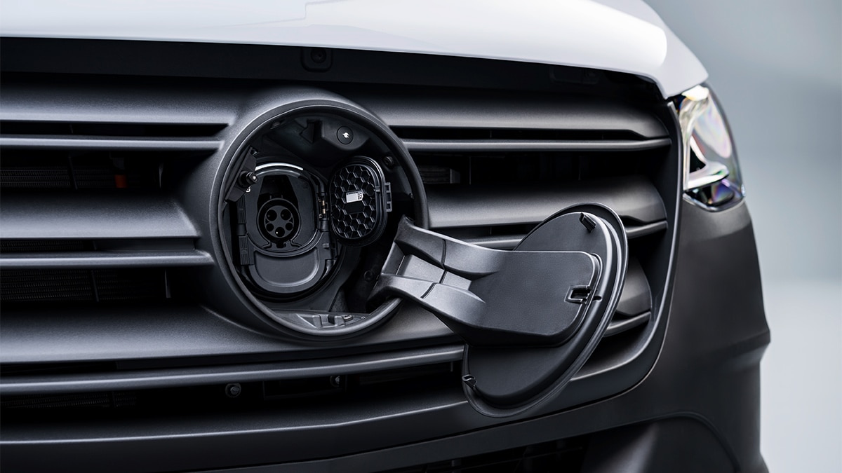 Clever: The charge port for the 2024 Mercedes-Benz eSprinter lies behind the three-pointed star on the grille. 