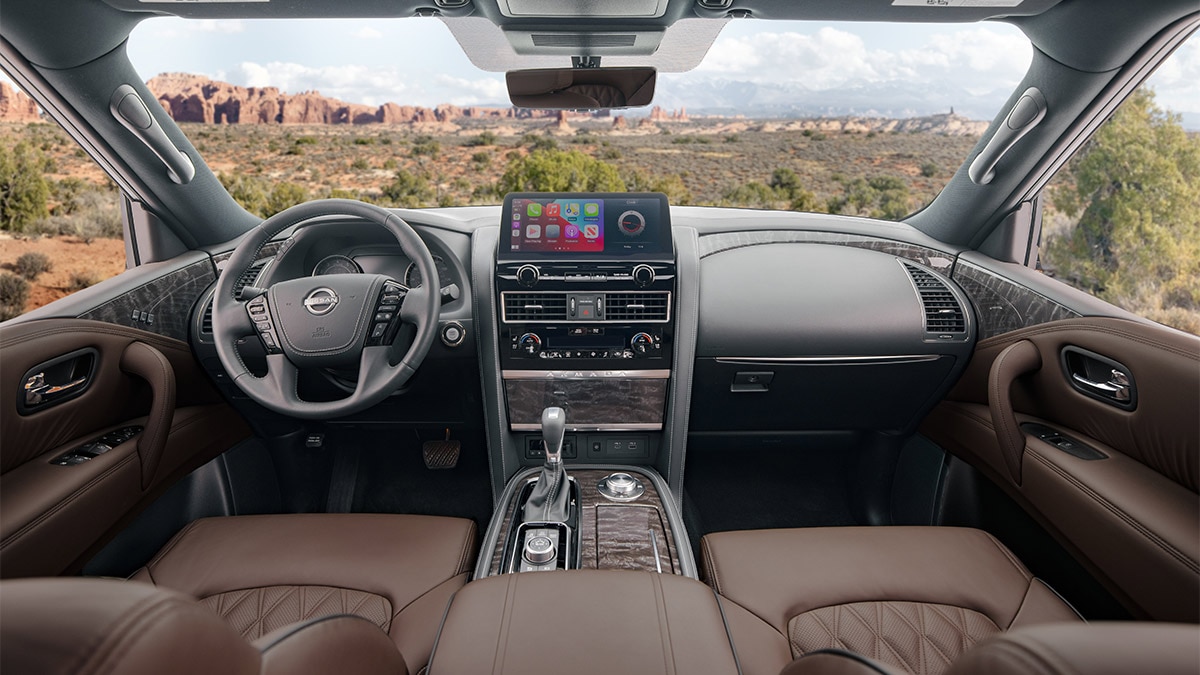 In Platinum trim, the 2024 Nissan Armada pampers occupants with quilted leather seating and even illuminated cupholders. 