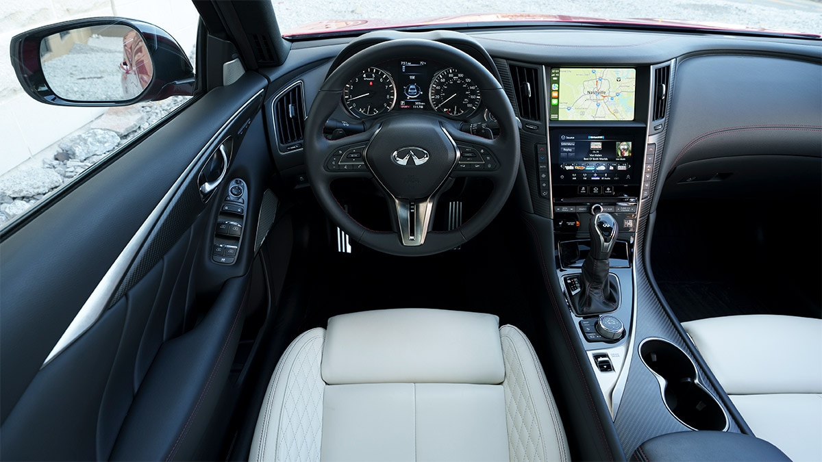 The Q50 dash: It's handsome, but a little out of date when compared to newer sport sedans. 