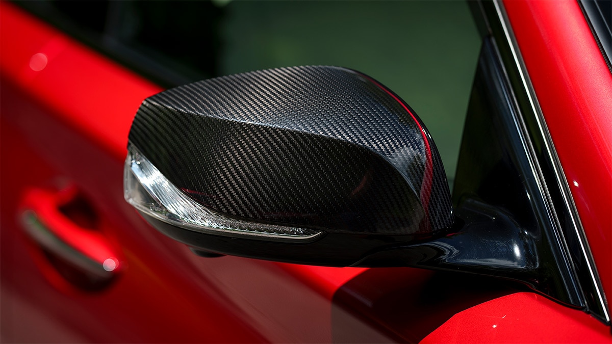 The potent Q50 Red Sport 400 gets carbon-fiber rearview mirrors and a rear spoiler also made of carbon. 