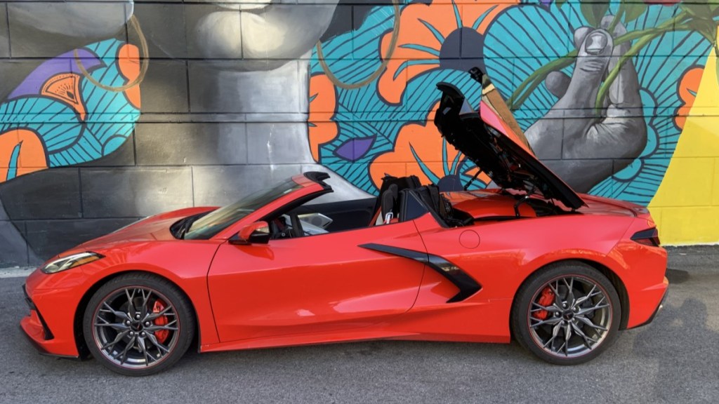 The 2024 Chevrolet Corvette Stingray Convertible with its top lowering