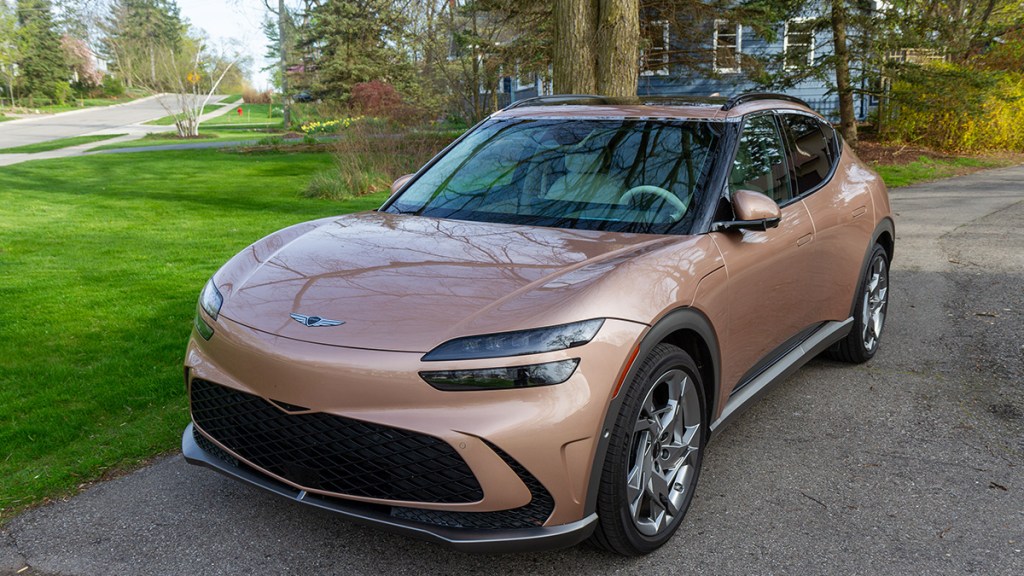 2024 Genesis GV60 in a fuchsia color.