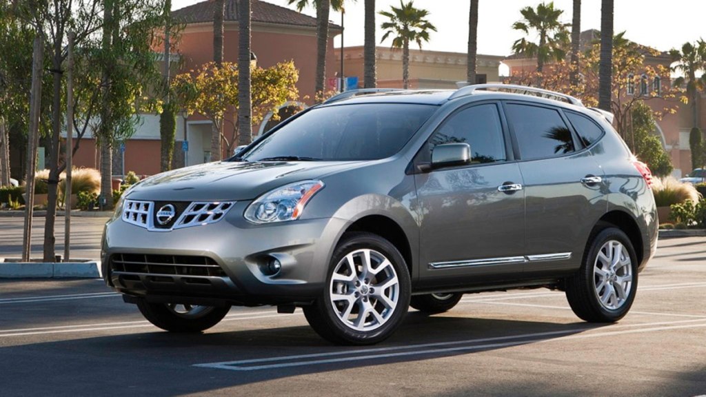 2013 nissan rogue parked outside.