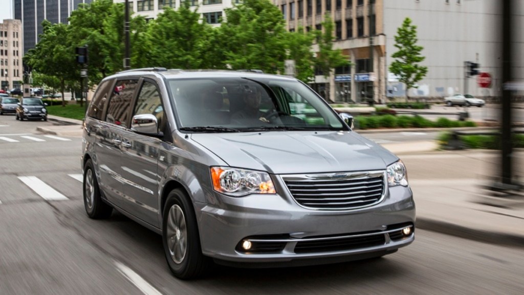 2015 Chrysler Town & Country driving on the road.