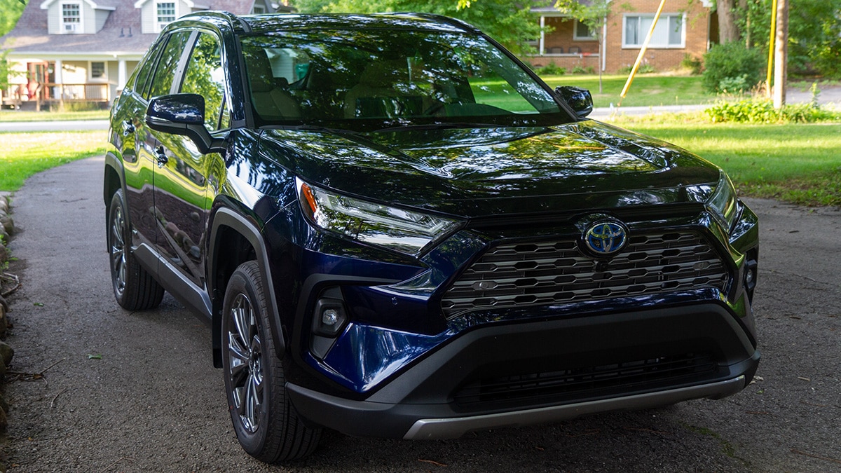 Toyota parked in a driveway.