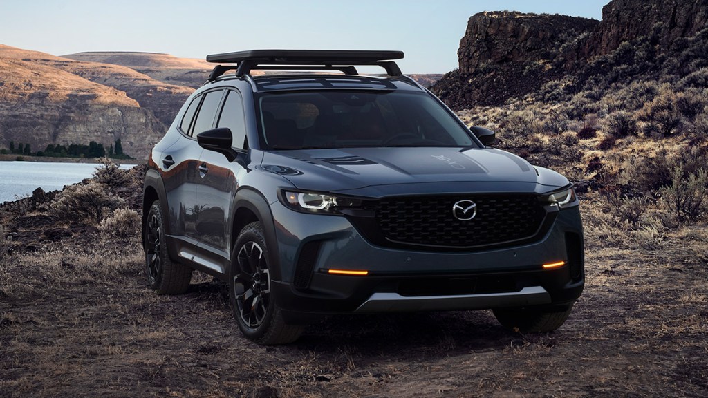 2025 Mazda CX-50 in Polymetal Gray paint, parked in the desert.