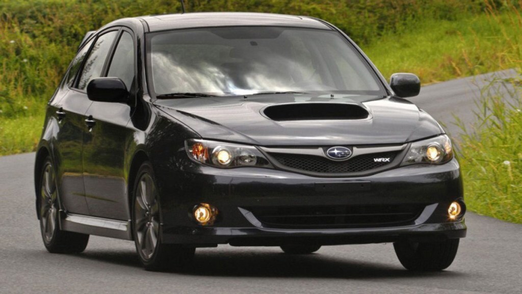 2009 Subaru Impreza in black.
