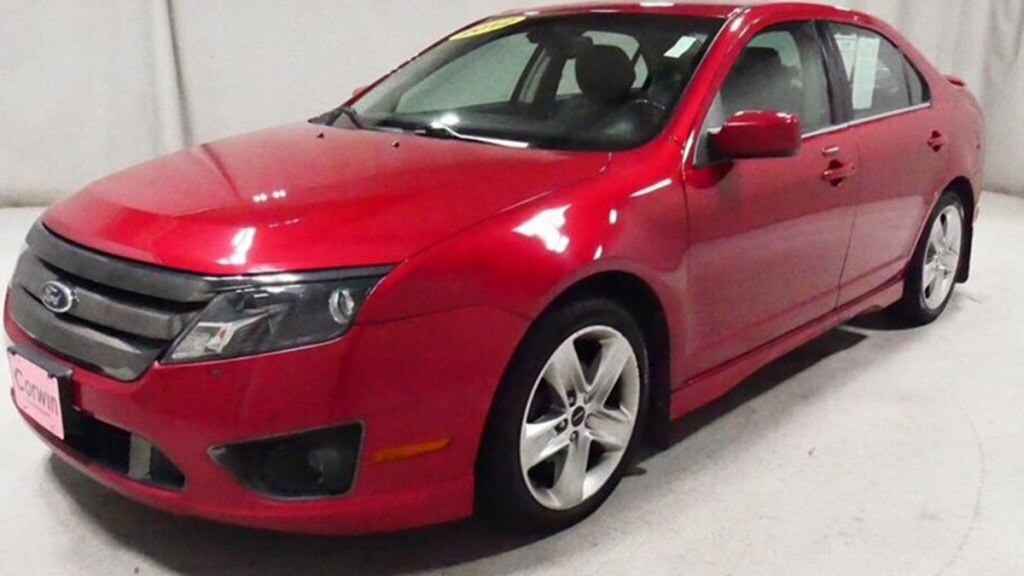 2012 Ford Fusion in red.