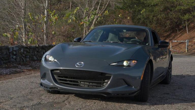 2023 Mazda MX-5 Miata in a dark grey color.