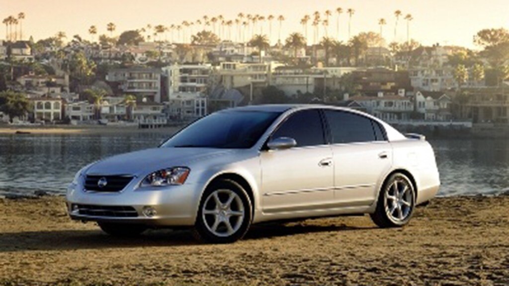 2002 Nissan Altima parked outside.