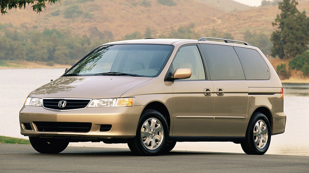 2004 Honda Odyssey parked by a lake.