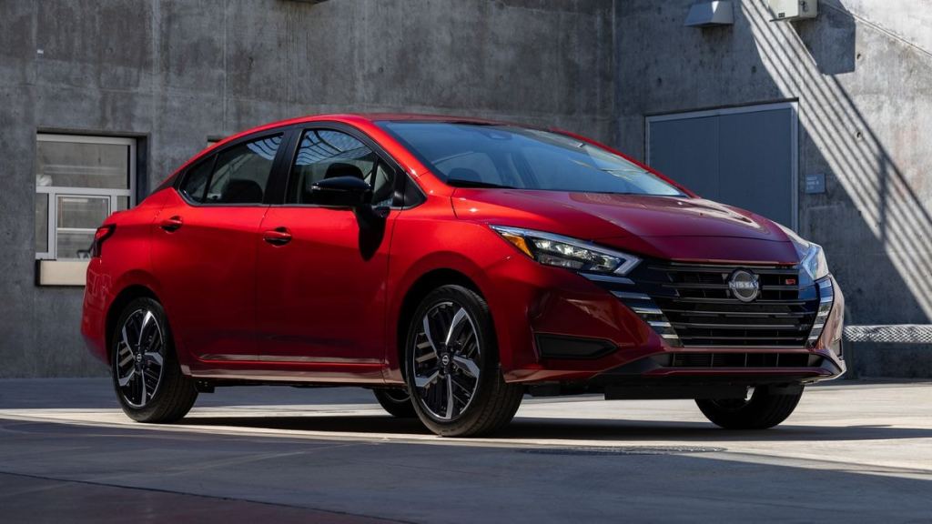 2025 Nissan Versa in red.